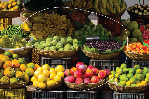 baskets of various fruits displayed at a market